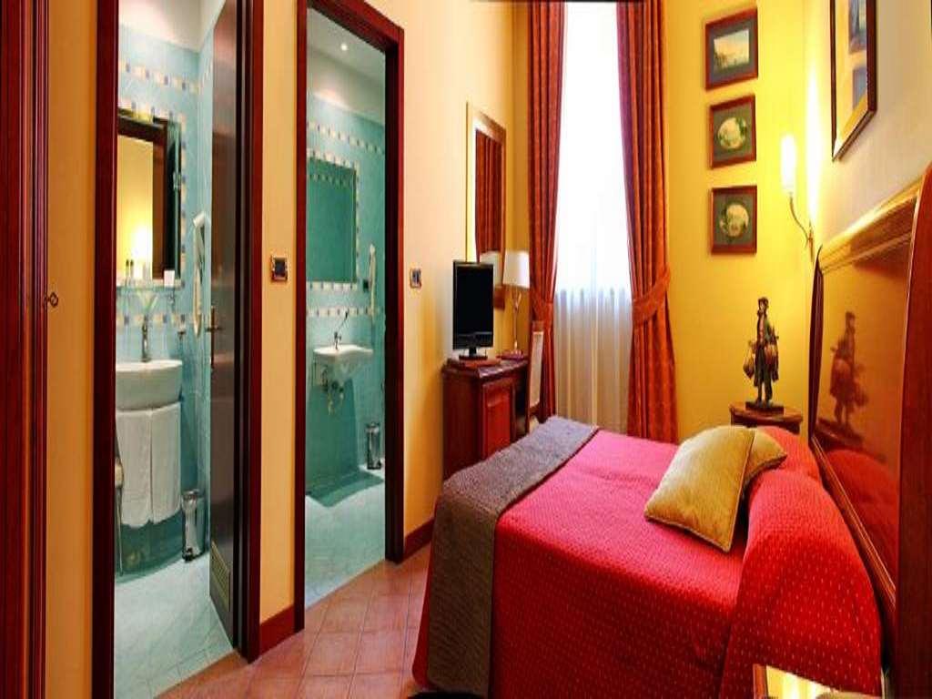 Le Cheminee Business Hotel Napoli Pokoj fotografie